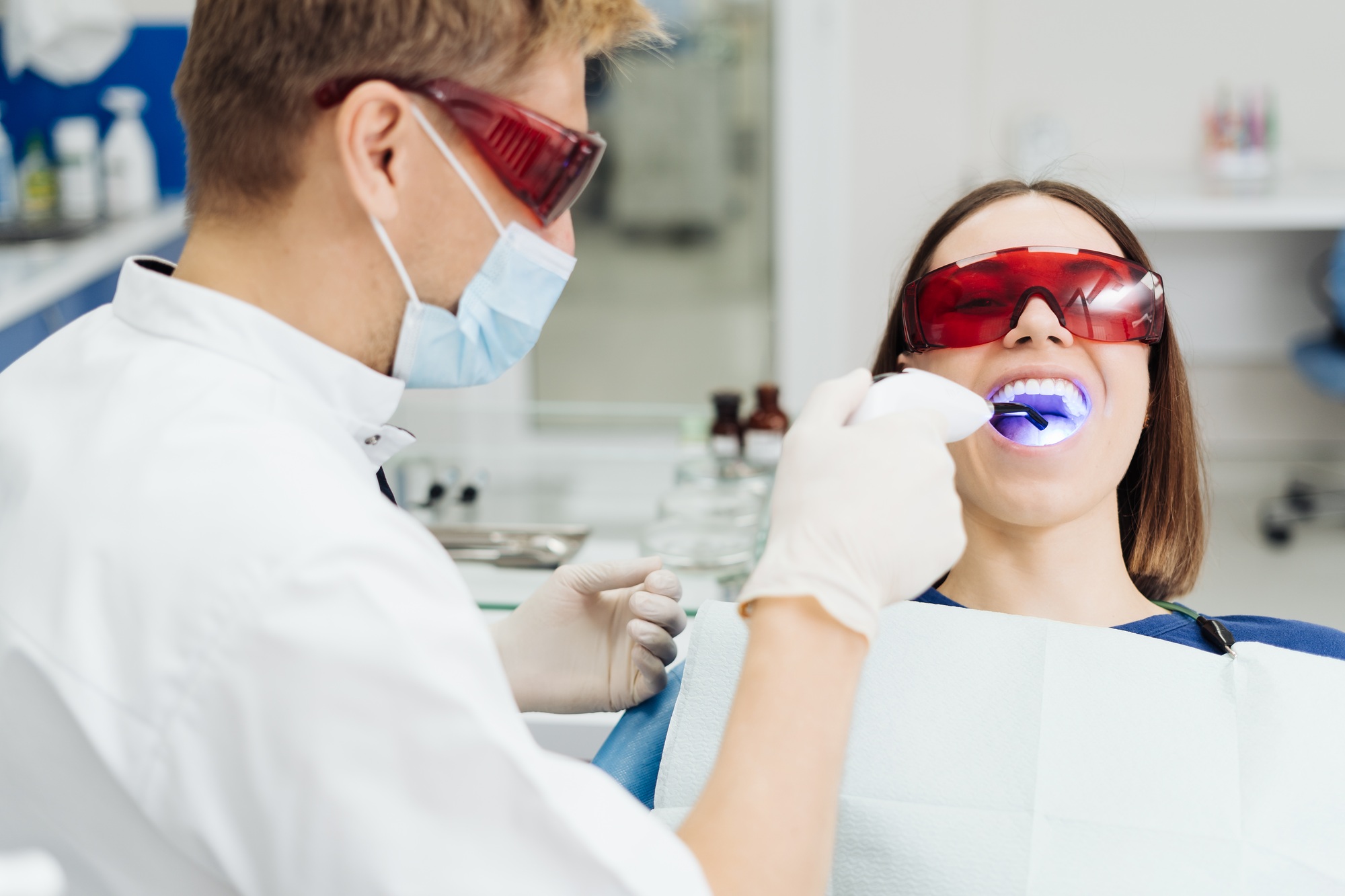 Young woman getting dental treatment